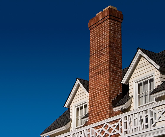 Brick chimney on the american house after chimney tuckpointing Palatine service