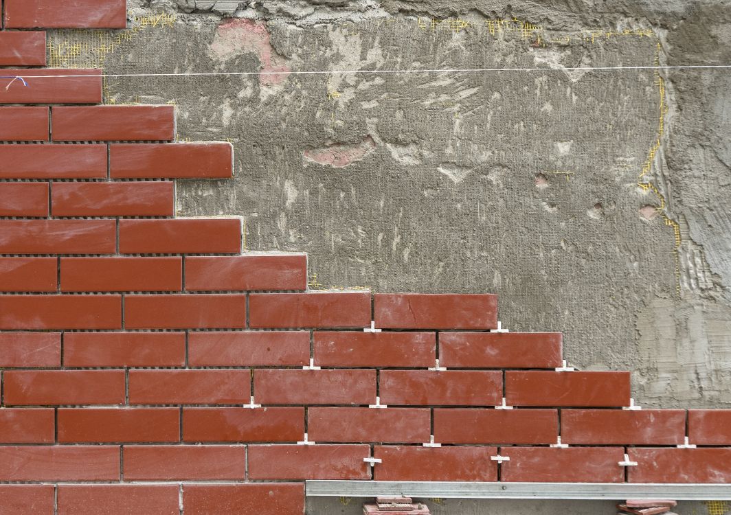 process of installing brick veneer by masonry contractors Palatine based