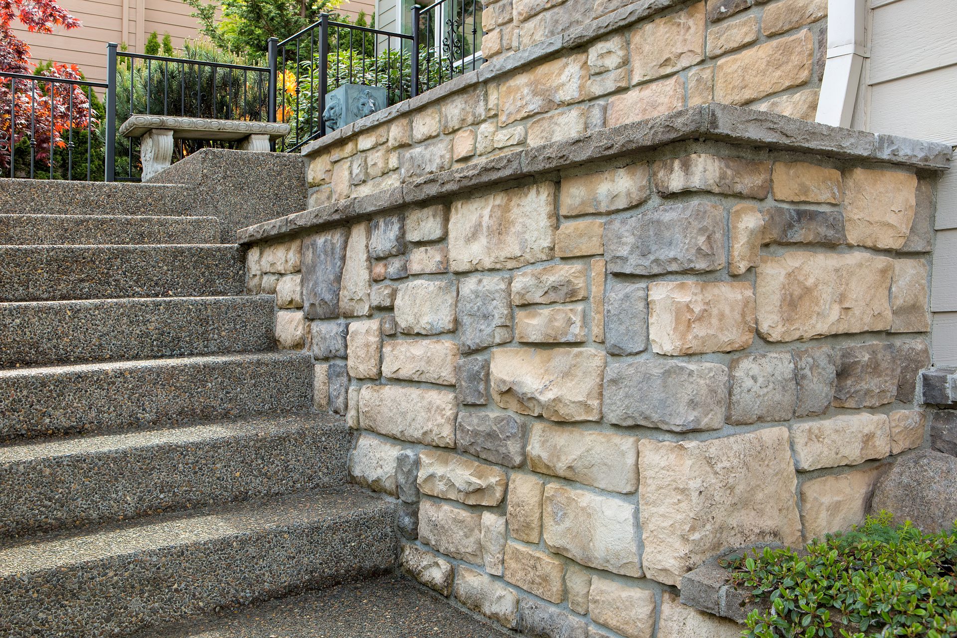 stone veneer installation on the outside staircase