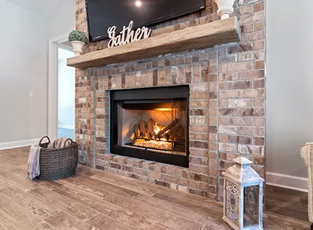 Stone fireplace installation in the living room